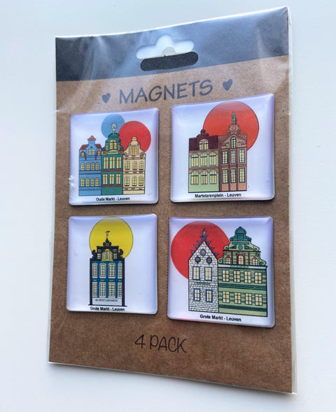 The epoxy magnet set featuring colourfully illustrated façades of historic Leuven houses from Grote Markt, Oude Markt, and Martelarenplein, displayed on a metal surface