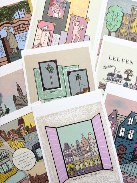 Colorful souvenir postcard set featuring illustrated scenes and landmarks of Leuven, including historic buildings, sculptures, and iconic city views in a playful artistic style.