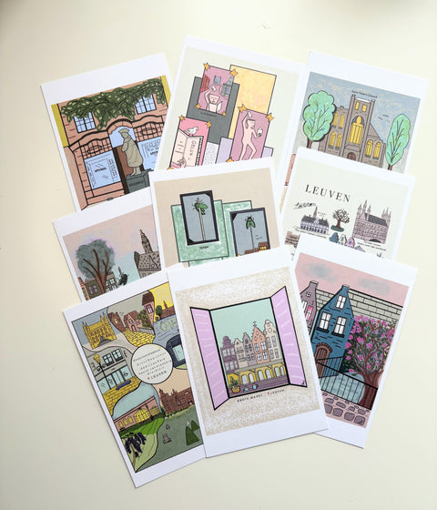 Colorful souvenir postcard set featuring illustrated scenes and landmarks of Leuven, including historic buildings, sculptures, and iconic city views in a playful artistic style.