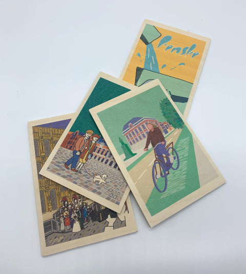 A decorative wooden accessory featuring illustrations of Leuven’s daily life.