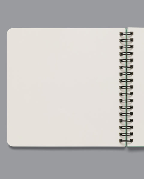 Spiral-bound Leuven notebook featuring Arenberg Castle and KU Leuven Library designs. Sturdy hardcover with durable metal binding and 80 acid-free blank pages. Compact 15x15 cm size, perfect for sketching, writing, or note-taking. A stylish and practical gift for Leuven lovers, students, and creatives.