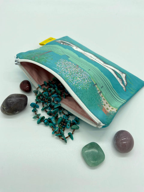 Handmade zipper pouch with illustrations of famous female statues in Leuven, including Fiere Margriet..