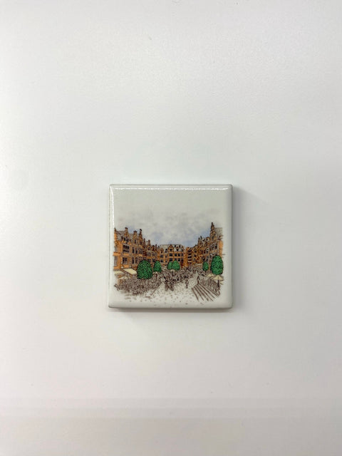 Ceramic fridge magnet featuring a detailed illustration of Leuven's iconic landmark, Oude Markt.