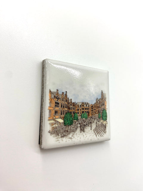Ceramic fridge magnet featuring a detailed illustration of Leuven's iconic landmark, Oude Markt.