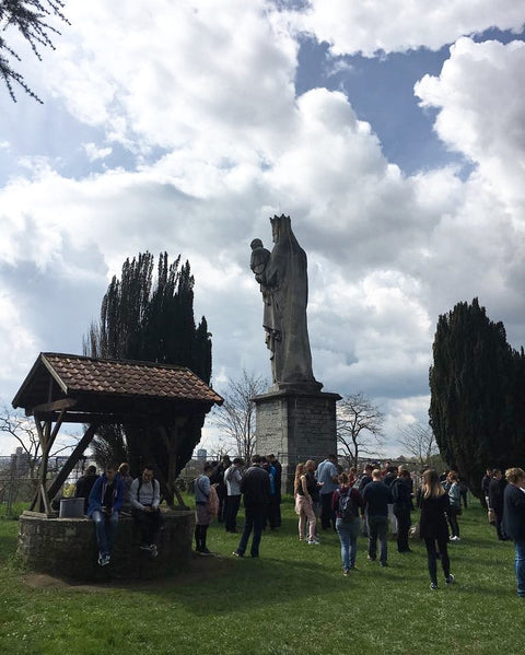 The Keizersberg Abbey in Leuven, built by Benedictine monks in the 19th century, features a remarkable Virgin Mary statue and gardens that double as a public park with stunning city views.
