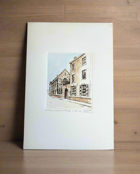 Limited-edition etching of Amerikaans College in Leuven by Belgian artist André Wellens. Handmade using traditional acid etching on eco-friendly paper. A rare collector’s piece, individually signed and numbered, with no reprints available. Perfect gift for architecture and fine art lovers.