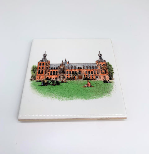 Ceramic coaster featuring a detailed illustration of the Arenberg Castle on a glossy white background.