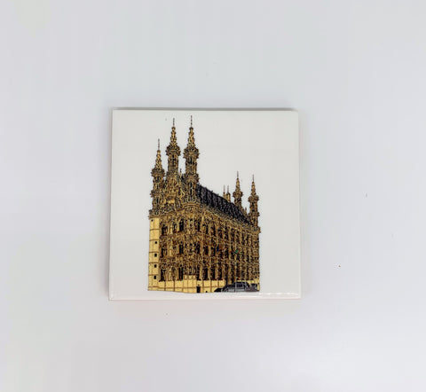 Ceramic coaster featuring a detailed illustration of Leuven’s historic Old Town Hall on a glossy white background.