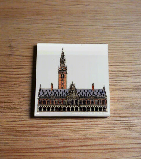 Ceramic coaster featuring a detailed illustration of the University Library and tower on a glossy white background.