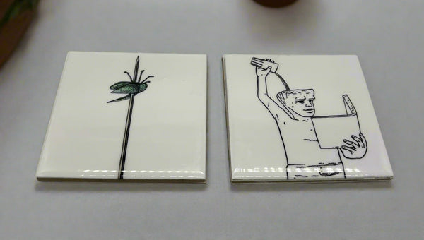 Beautiful ceramic coaster set featuring Leuven’s iconic landmarks – Jan Fabre's Beetle Totem and Fonske. Durable, high-quality coasters with soft EVA backing to prevent scratches. Perfect for home, office, or as a unique Leuven souvenir. Size: 10 cm x 10 cm. A stylish and practical gift for Leuven lovers