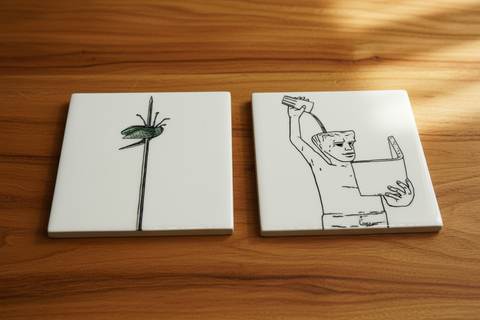 Beautiful ceramic coaster set featuring Leuven’s iconic landmarks – Jan Fabre's Beetle Totem and Fonske. Durable, high-quality coasters with soft EVA backing to prevent scratches. Perfect for home, office, or as a unique Leuven souvenir. Size: 10 cm x 10 cm. A stylish and practical gift for Leuven lovers