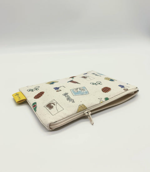 Handmade mini zipper pouch made from 100% cotton, featuring a pattern with small symbols representing Leuven. Compact and lightweight, perfect for storing keys, money, earphones, and other small essentials