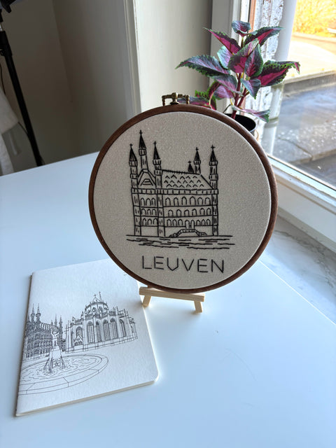 beautifully hand-embroidered design of the Old Town Hall — a true piece of Leuven’s soul