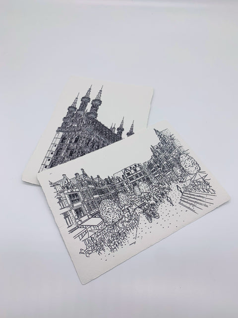 Set of 2 illustrated postcards featuring Leuven’s Old Town Hall and Oude Markt, printed on handmade recycled paper (300g). Eco-friendly, 12 cm x 17 cm, perfect for sending or decorating.