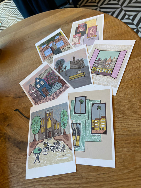 Set of 9 Leuven-themed postcards featuring vibrant illustrations of the city's iconic landmarks. Includes envelopes, postcard size 15 cm x 10 cm. Perfect as a keepsake or gift.