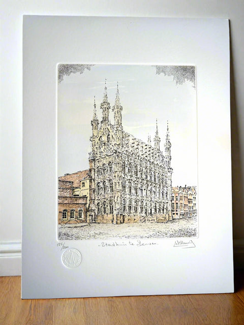 Limited-edition etching of the Old Town Hall in Leuven by Belgian artist André Wellens. Handmade using traditional acid etching on eco-friendly paper. A rare collector’s piece, individually signed and numbered, with no reprints available. Perfect gift for architecture and fine art lovers.