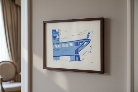 Blue architectural drawing of a building with a staircase on a beige background