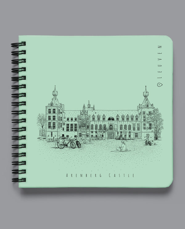 Spiral-bound Leuven notebook featuring Arenberg Castle and KU Leuven Library designs. Sturdy hardcover with durable metal binding and 80 acid-free blank pages. Compact 15x15 cm size, perfect for sketching, writing, or note-taking. A stylish and practical gift for Leuven lovers, students, and creatives.