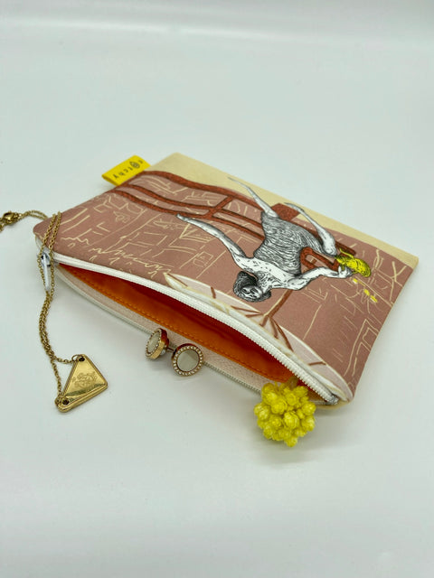 Handmade zipper pouch featuring a screen-printed illustration of Kotmadam, the iconic female statue in Leuven. Lined interior, high-quality fabric, and perfect for everyday essentials.